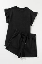 Mommas Hive textured ruffle split top and drawstring shorts two-piece set, polyester-elastane fabric, stylish and comfortable summer outfit.