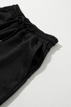 Mommas Hive textured ruffle split top and drawstring shorts two-piece set, lightweight polyester-elastane fabric, stylish casual wear