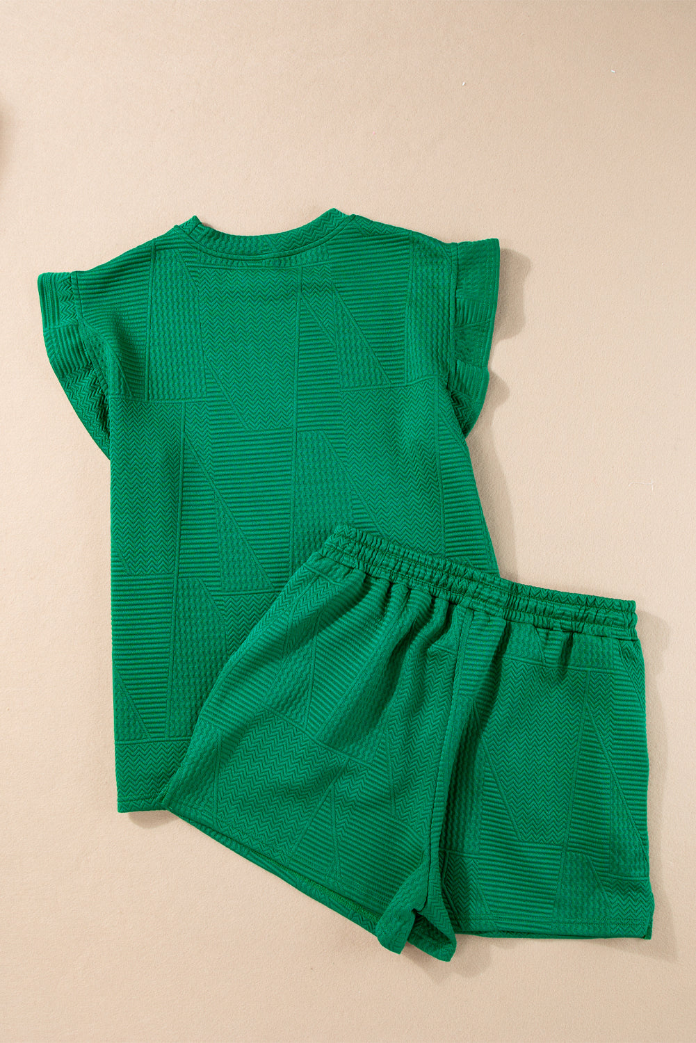 Mommas Hive textured ruffle split top and drawstring shorts two-piece set, with floral pattern, lightweight fabric, and relaxed fit.