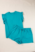 Mommas Hive textured ruffle split top and drawstring shorts two-piece set, featuring a stylish ruffled top and comfortable shorts.