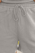 Mommas Hive textured ruffle split top with matching drawstring shorts, two-piece set for casual and stylish wear.