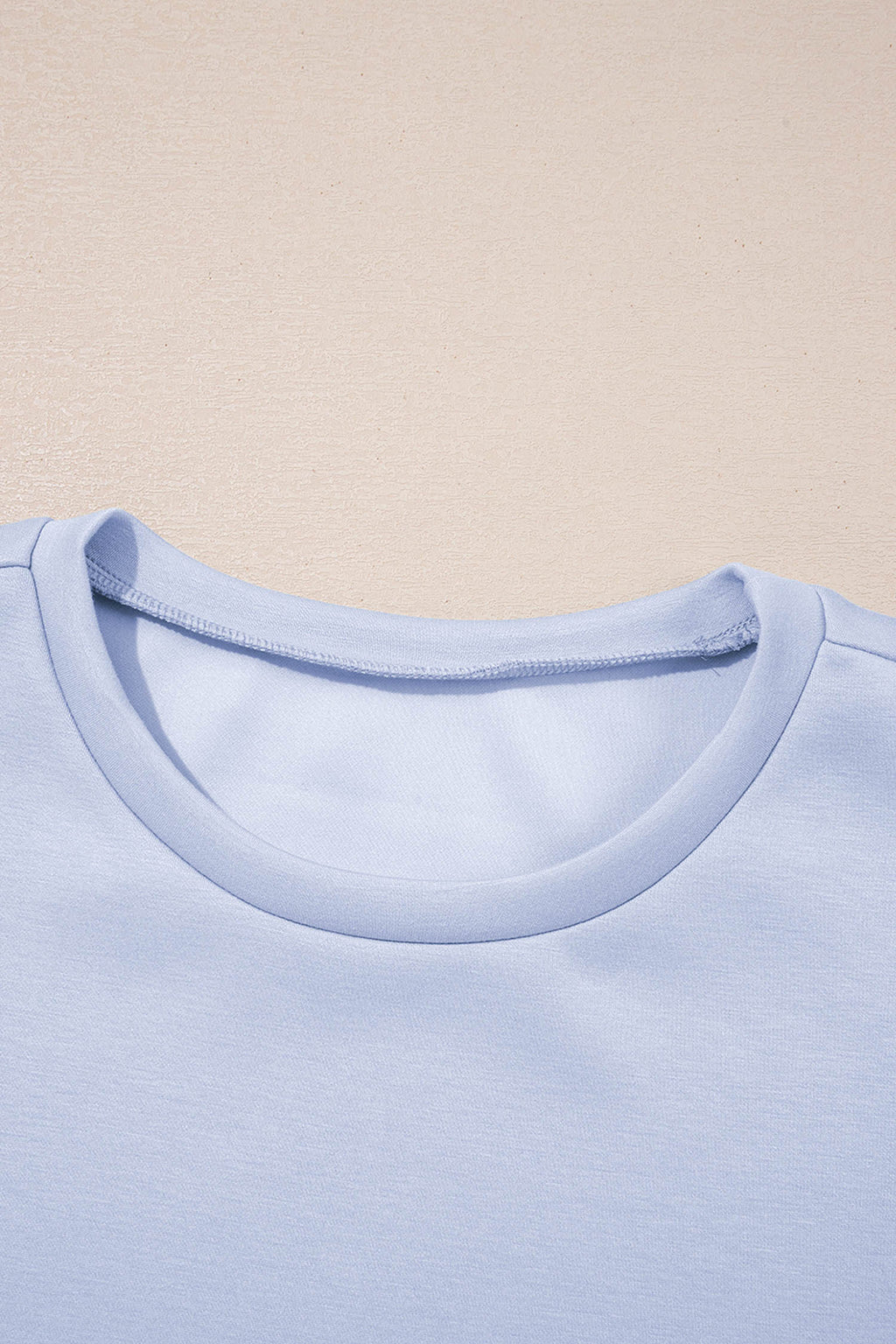 Mommas Hive puff sleeve pearl-embellished scallop trim top and matching skort set, in Beau Blue, made of polyester, viscose, and elastane.