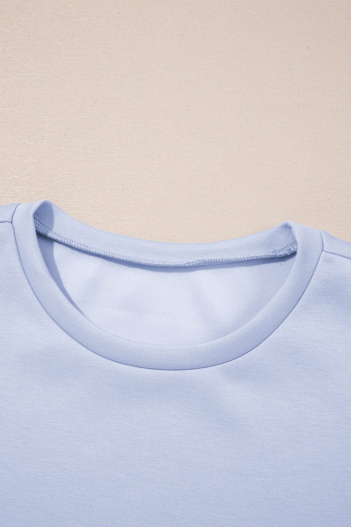 Mommas Hive puff sleeve pearl-embellished scallop trim top and matching skort set, in Beau Blue, made of polyester, viscose, and elastane.