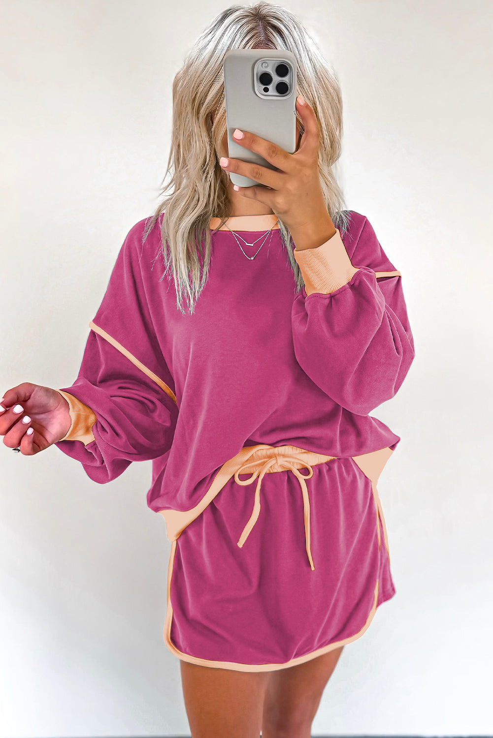 Rose red color contrast loose pullover and lace-up waist skort set by Mommas Hive, casual two-piece dress with polyester and cotton blend.