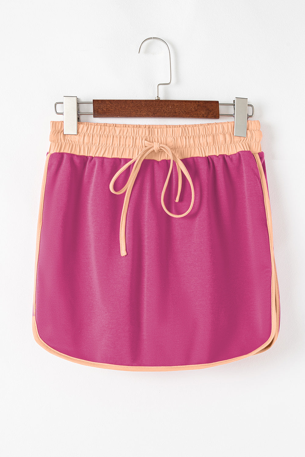 Mommas Hive rose red contrast two-piece set featuring a loose pullover and lace-up waist skort, made of polyester and cotton blend.