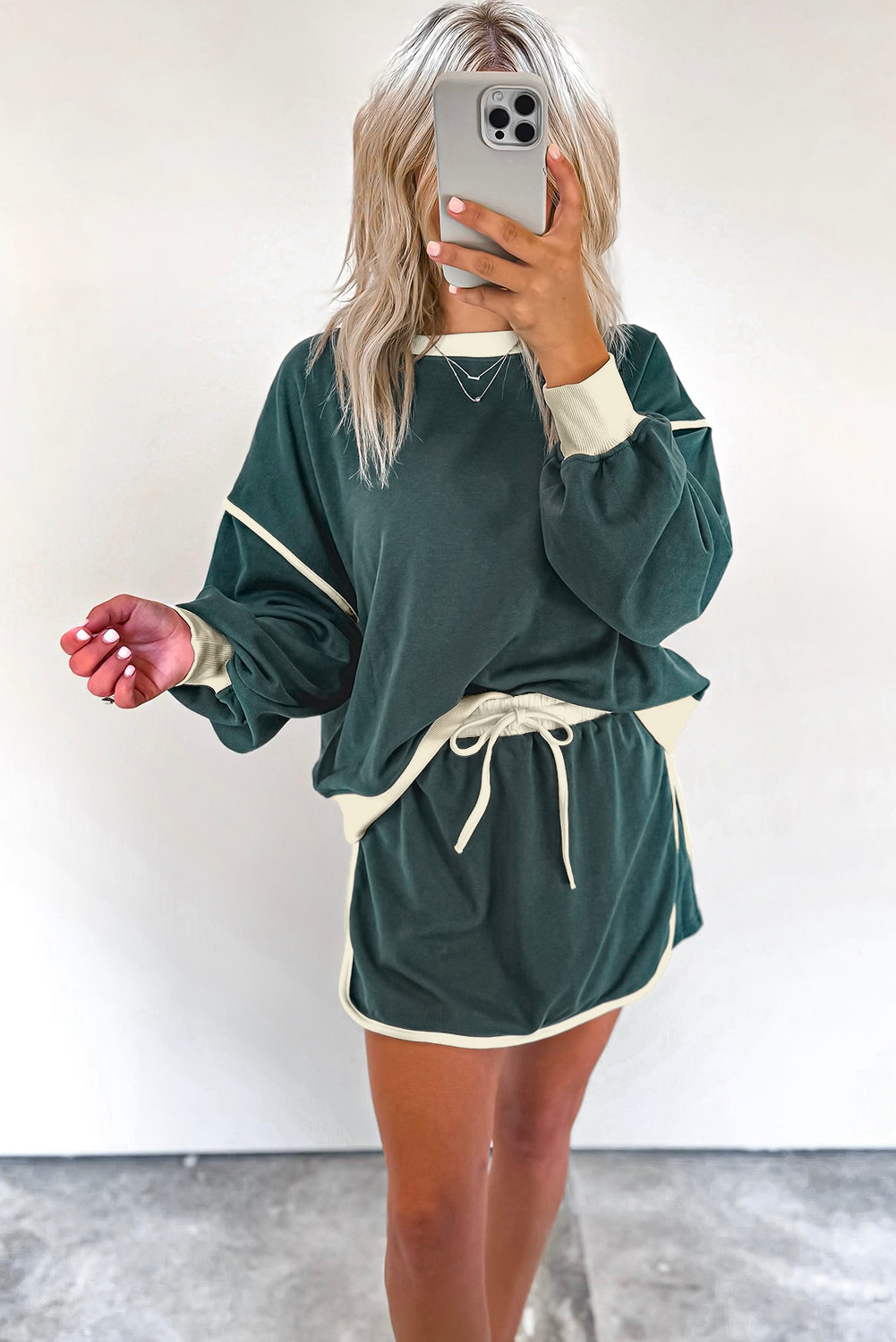 Rose red contrast loose pullover and lace-up waist skort set by Mommas Hive, featuring a stylish two-piece dress with polyester and cotton.