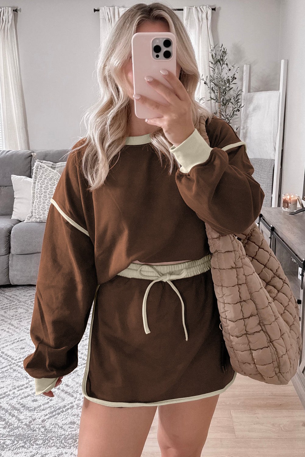 Rose red color contrast loose pullover and lace-up waist skort set by Mommas Hive, featuring a relaxed fit and stylish design.