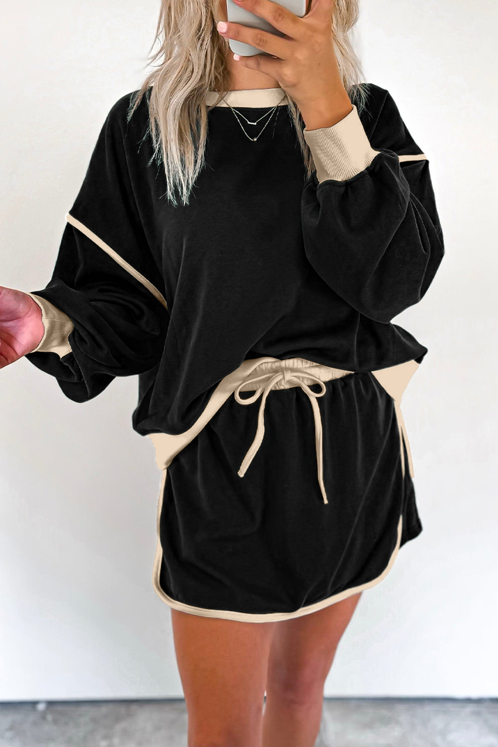 Rose red contrast loose pullover and lace-up waist skort set from Mommas Hive, featuring a relaxed fit and stylish design.