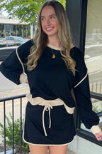 Rose red contrast loose pullover and lace-up waist skort set from Mommas Hive, featuring a stylish two-piece dress with casual comfort.