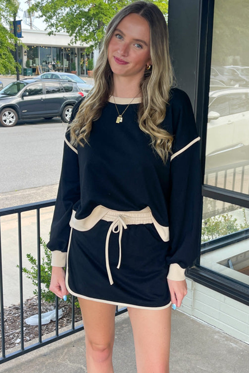 Rose red contrast loose pullover and lace-up waist skort set from Mommas Hive, casual two-piece outfit with polyester and cotton fabric.