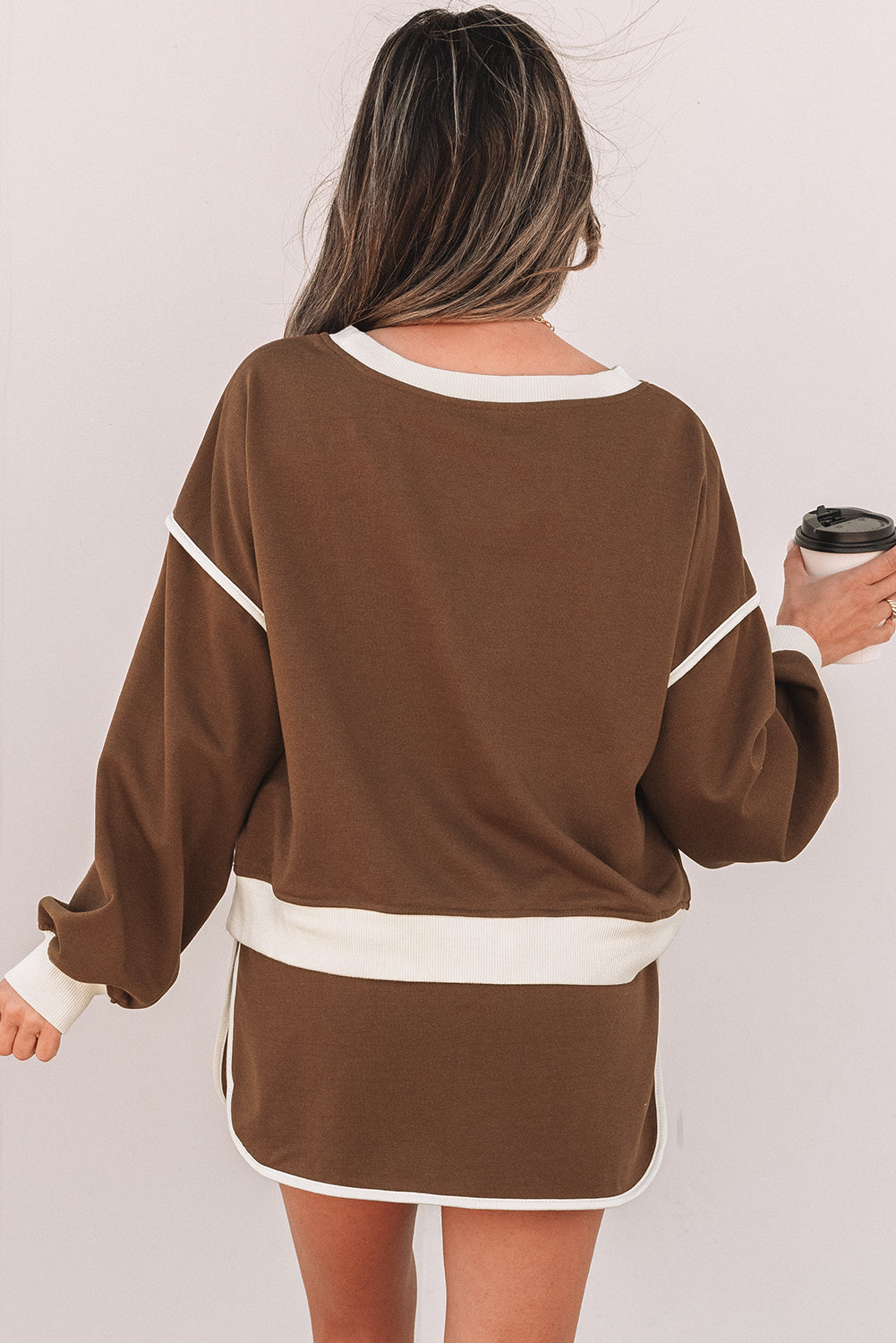 Rose red contrast loose pullover and lace-up waist skort set by Mommas Hive, two-piece outfit with polyester and cotton blend.