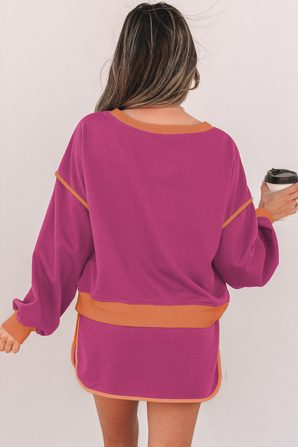 Rose red color contrast loose pullover and lace-up waist skort set by Mommas Hive, featuring a comfortable two-piece design.