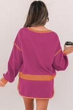 Rose red color contrast loose pullover and lace-up waist skort set by Mommas Hive, featuring a comfortable two-piece design.