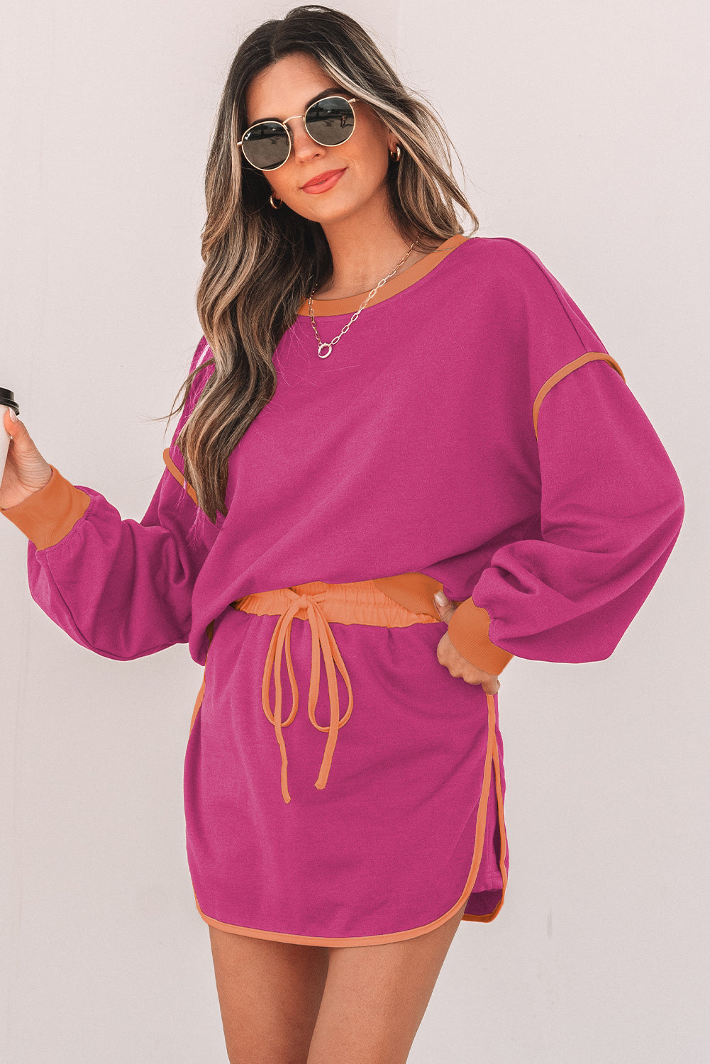 Rose red contrast loose pullover and lace-up waist skort set by Mommas Hive, casual two-piece outfit with polyester and cotton fabric.
