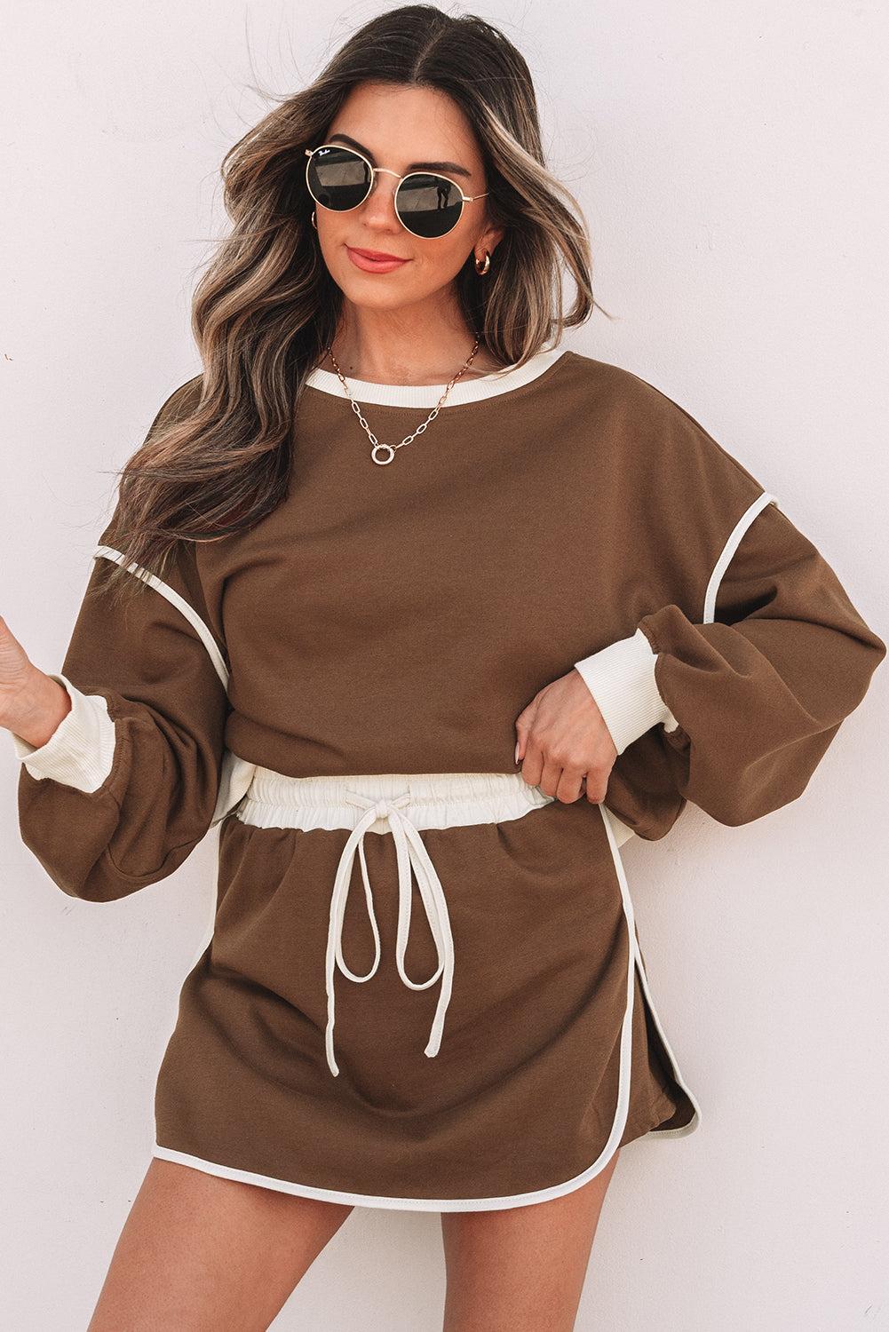 Rose red contrast loose pullover and lace-up waist skort set by Mommas Hive, stylish two-piece dress with polyester and cotton fabric.