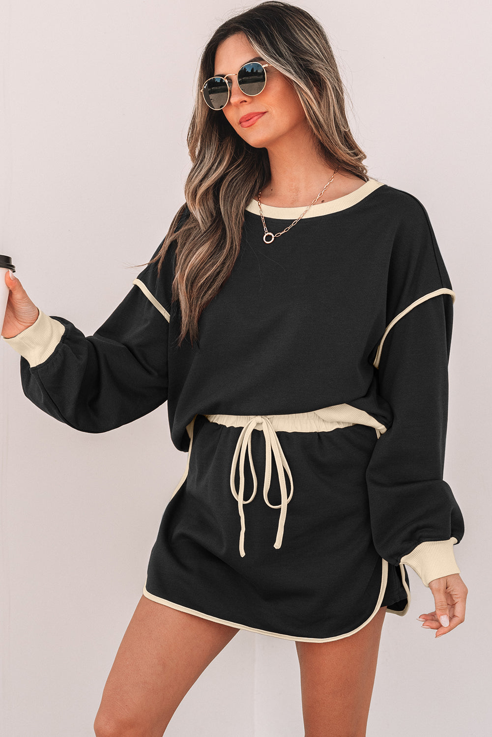 Rose red color contrast loose pullover and lace-up waist skort set by Mommas Hive, featuring casual two-piece dress style.