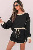 Rose red color contrast loose pullover and lace-up waist skort set by Mommas Hive, featuring casual two-piece dress style.