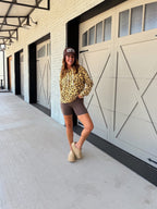 Oliver & Otis Lexi Leopard Hoodie featuring a cozy knit fabric and stylish leopard print design.