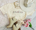 Blue Grandma Floral Embroidered T-shirt from P&PD Wholesale, featuring colorful floral embroidery on a casual tee.