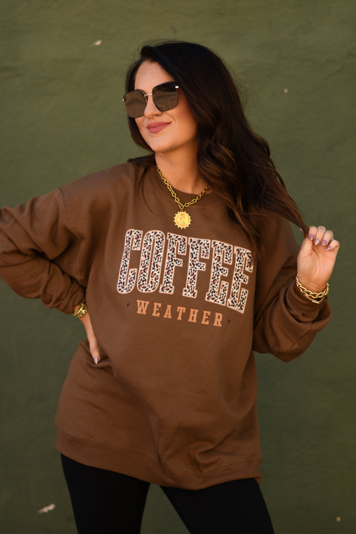 Brown Coffee Weather Leopard sweatshirt by P&PD Wholesale featuring a cozy sweatshirt with a leopard print design.