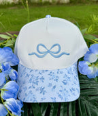 Blue embroidered bow floral hat with decorative floral embroidery and a stylish bow detail, perfect for sun protection.