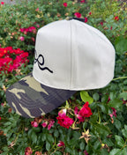 Camo embroidered bow hat by P&PD Wholesale featuring a stylish bow design and camouflage pattern on a casual cap