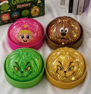 Grinch Family Mystery Dumpling from P&PD Wholesale, featuring festive holiday design and colorful packaging.