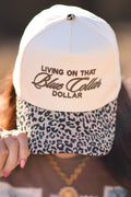 Blue leopard hat from P&PD Wholesale featuring bold animal print and a casual, stylish design.