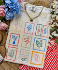 Ivory Floral Stamp Tee by P&PD Wholesale, showcasing a casual cotton t-shirt with floral print and vintage-inspired design.