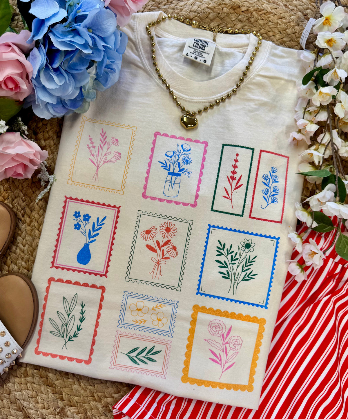 Ivory Floral Stamp Tee by P&PD Wholesale, showcasing a casual cotton t-shirt with floral print and vintage-inspired design.