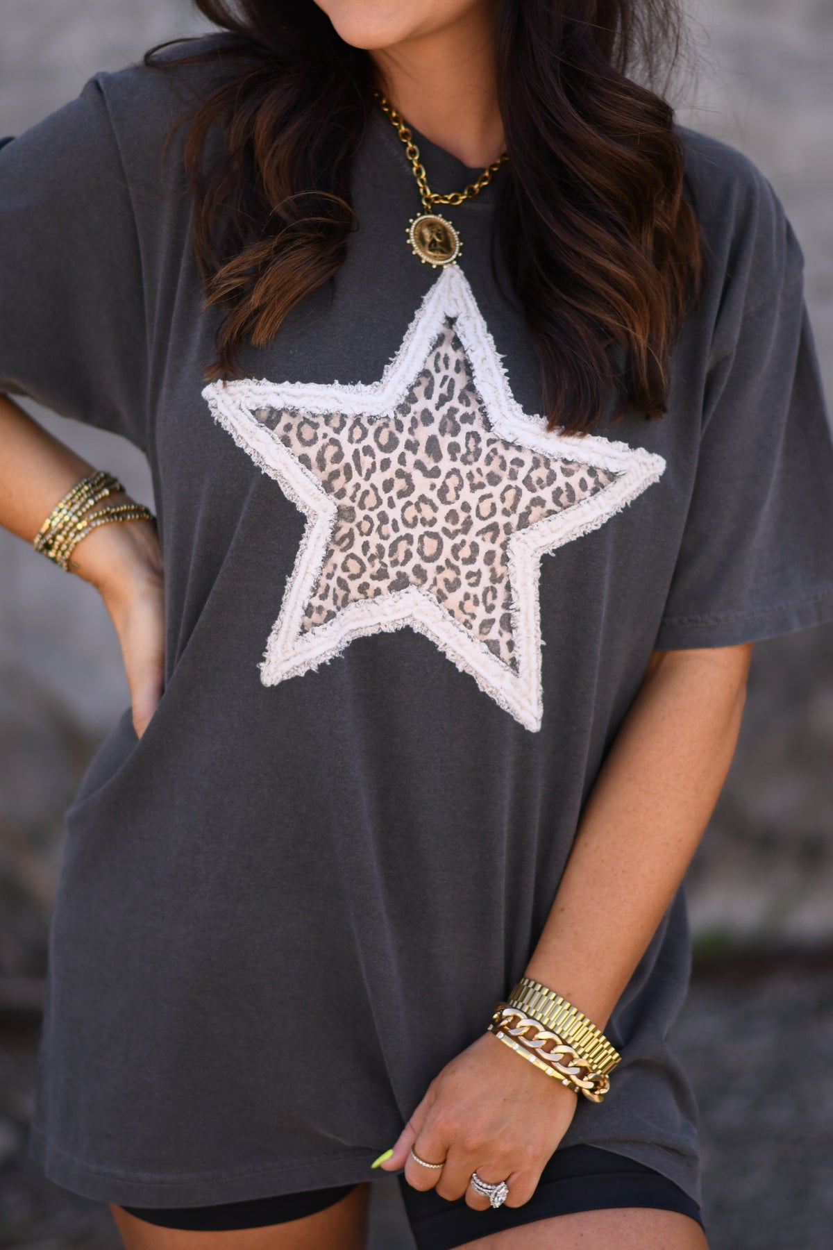 Leopard star faux patch T-shirt by P&PD Wholesale featuring a graphic leopard and star design on a casual tee.