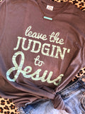 Charcoal-colored ceramic mug with "Leave the Judgin’ to Jesus" printed in bold text, designed by P&PD Wholesale.