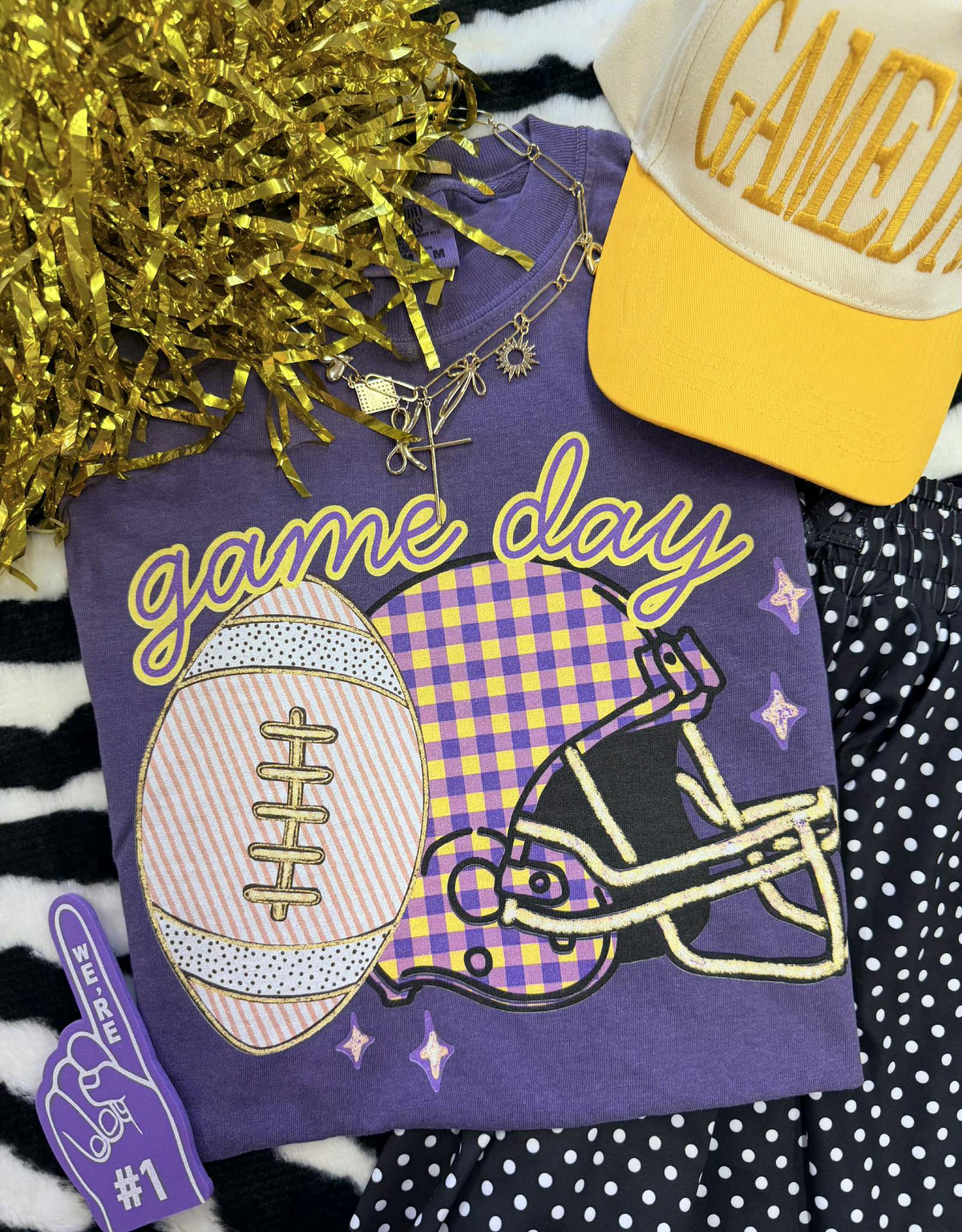 Purple Gingham Helmet Tee by P&PD Wholesale featuring a football helmet graphic on a casual T-shirt.