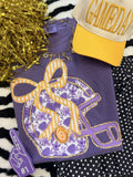 Purple floral helmet T-shirt by P&PD Wholesale featuring a vibrant floral design on a casual tee shirt.