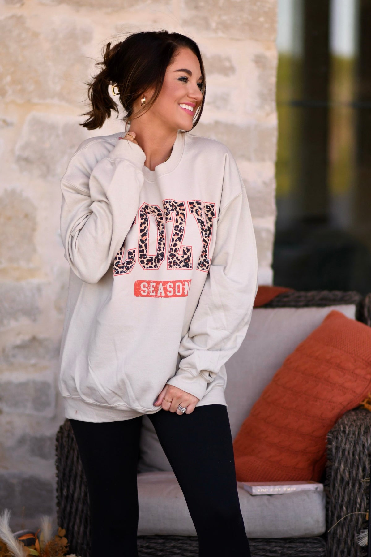 Tan Cozy Season sweatshirt by P&PD Wholesale, showing soft fabric and relaxed fit on a hanger.