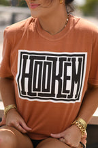 Black Hookem' Tee by P&PD Wholesale featuring a graphic design on the front and a casual fit.