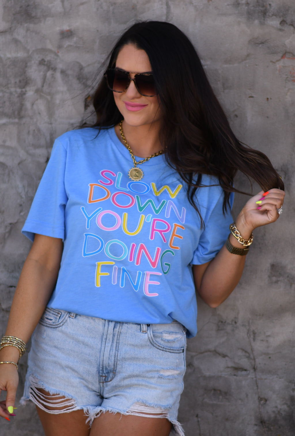 Heather Colombia Blue T-shirt by P&PD Wholesale with "Slow Down You're Doing Fine" slogan in black text.