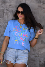 Heather Colombia Blue T-shirt by P&PD Wholesale with "Slow Down You're Doing Fine" slogan in black text.