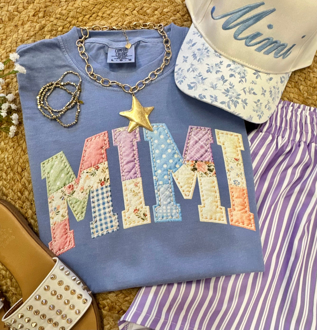 Custom patchwork denim Mother’s Day T-shirt by P&PD Wholesale, featuring colorful stitched designs on a washed denim fabric.