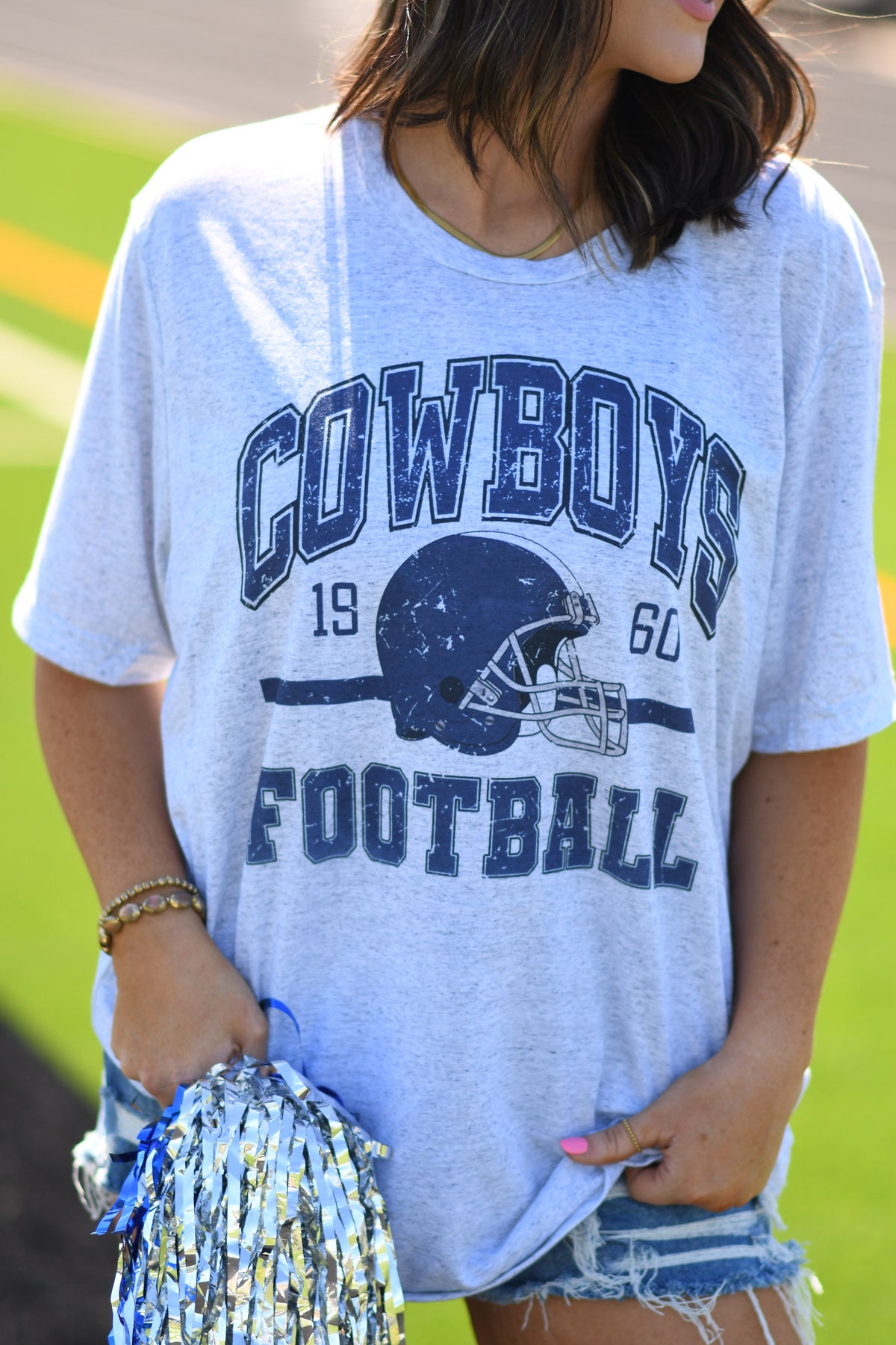 Youth Cowboys Football Tee by P&PD Wholesale, ash-colored shirt with Cowboys logo and football graphic, casual sportswear for kids.