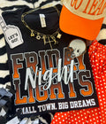 Orange Friday Night Lights T-shirt by P&PD Wholesale, featuring bold black lettering on a casual tee for teens and youth.