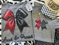 Maroon Bow T-Shirt from P&PD Wholesale featuring a bold "Loud & Proud" design on a deep heather background.