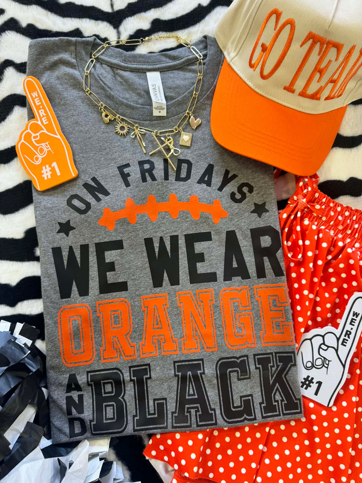Deep heather orange and black "On Fridays We Wear Orange & Black" T-shirt by P&PD Wholesale, front view