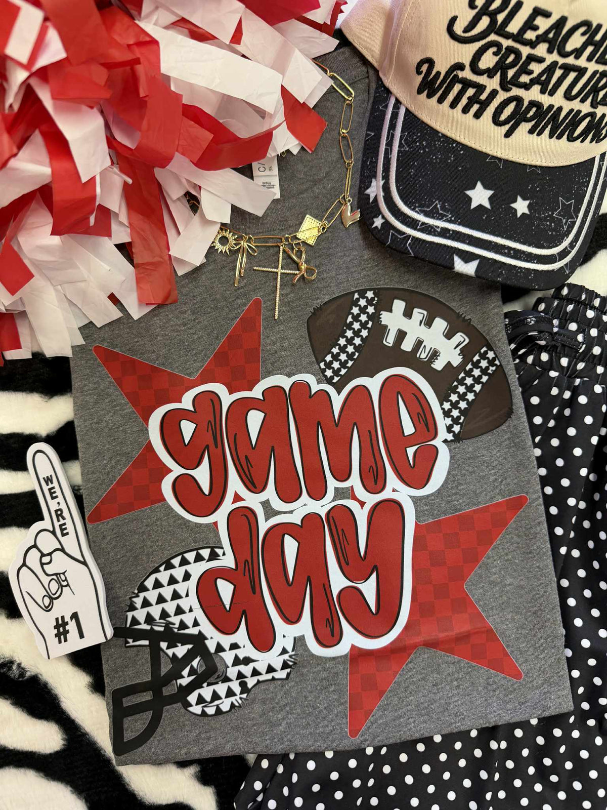 Red Game Day Checker Stars and Helmet T-shirt by P&PD Wholesale, featuring a vibrant checkered star design and football helmet graphic.