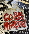 Maroon GO BIG T-shirt by P&PD Wholesale, athletic fit, heather fabric, shown on a model.
