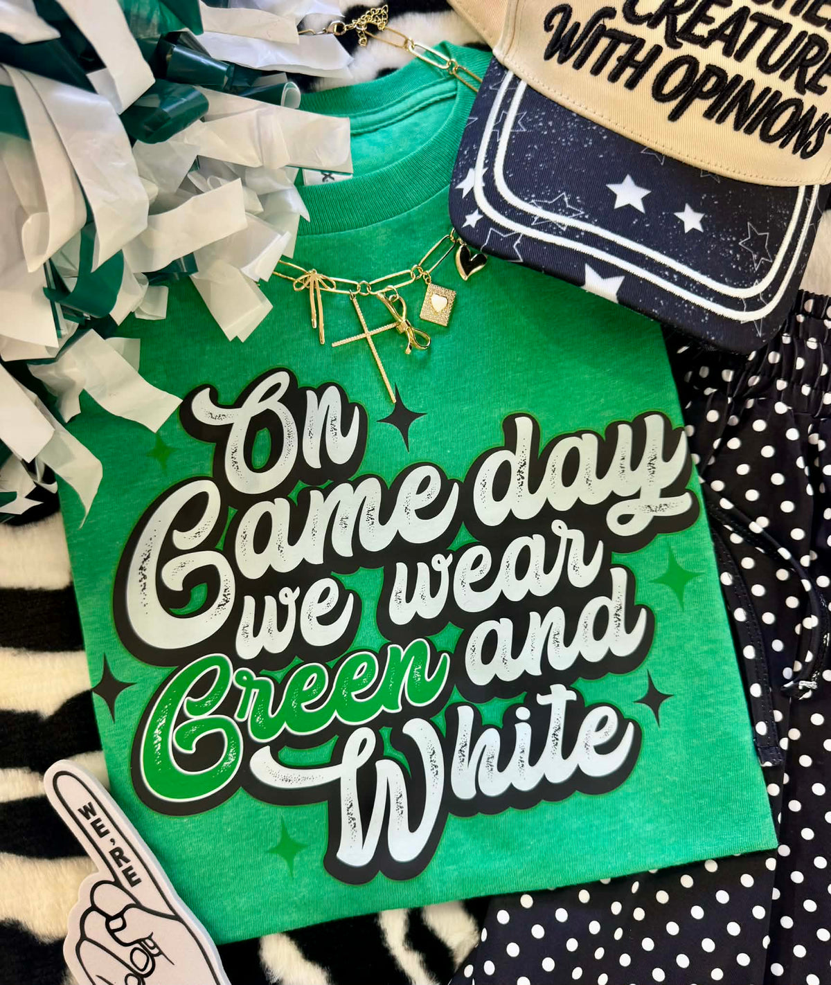 Heather Kelly green T-shirt from P&PD Wholesale with "On Gameday We Wear Green and White" text, casual and comfortable fit.