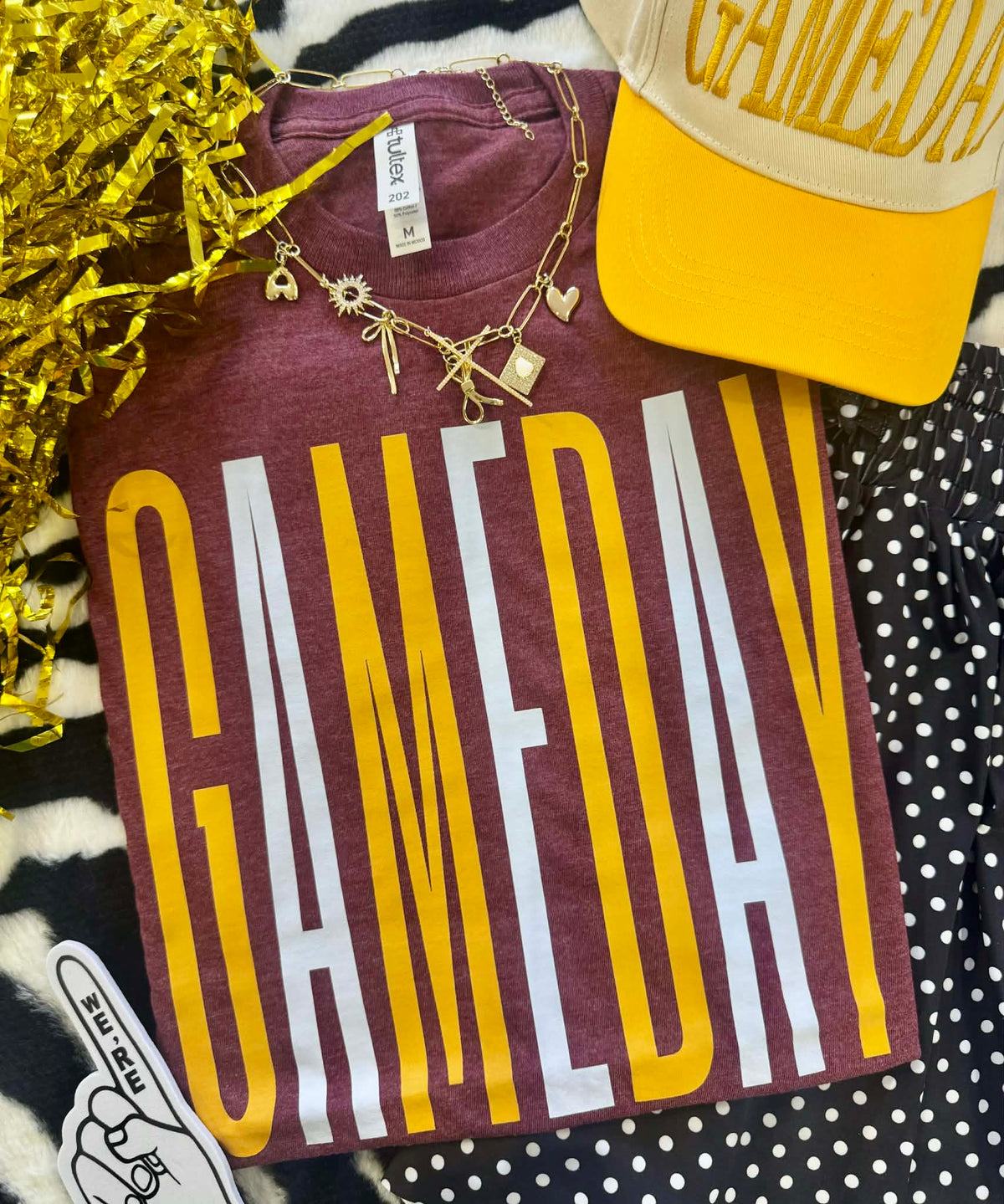 Tall white and gold Gameday Maroon tee by P&PD Wholesale, heather maroon fabric with white and gold accents.