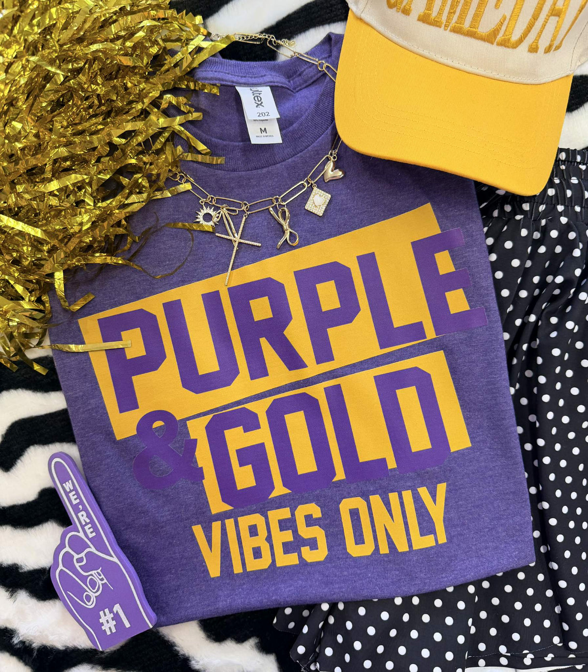 Purple and gold "Vibes Only" T-shirt by P&PD Wholesale, Heather purple fabric with bold gold lettering design.