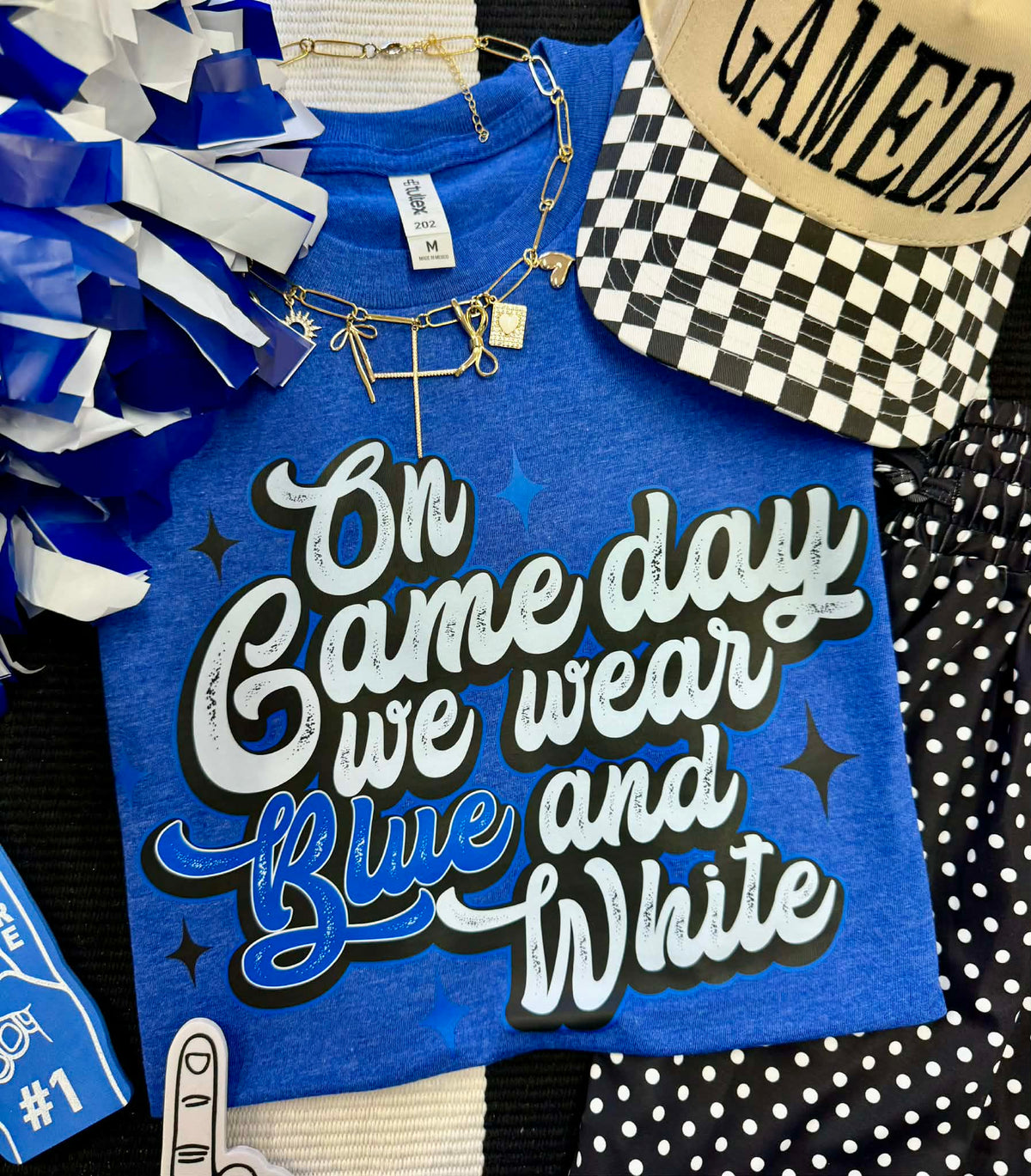 Heather royal blue "On Gameday We Wear Blue and White" tee by P&PD Wholesale, casual t-shirt with team spirit design.