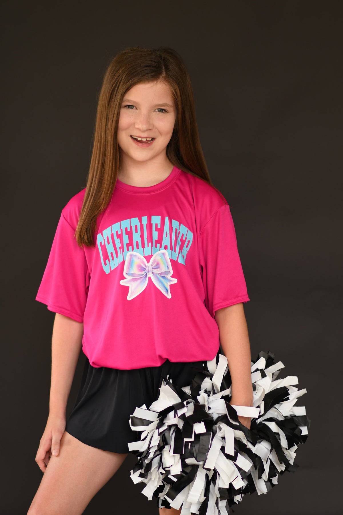 Hot pink Cheerleader Bow Dri-Fit Tee by P&PD Wholesale, lightweight athletic shirt with cheerleader bow design.